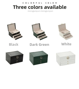 Dual-layer leather jewelry box with quilted patterns shown in black green and white
