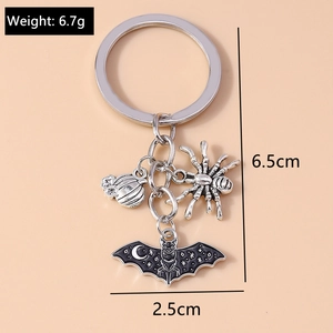 Halloween keychain featuring pumpkin spider and bat charms with size measurements