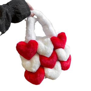 Winter heart-shaped plush tote bag with red and white soft faux fur patchwork design