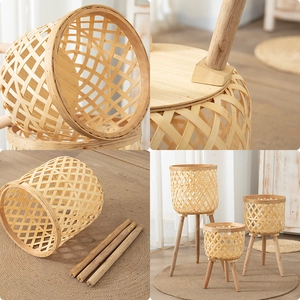 Large wicker plant basket set with wooden legs for indoor monsteras and home decor