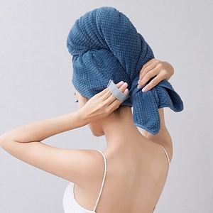 Navy blue coral fleece hair towel wrap shown on a model for fast drying and absorbency