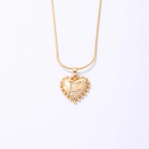 Golden heart pendant necklace with crystal letter L on a minimalist chain for women