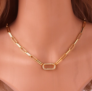 Gold plated interlocking paperclip chain necklace with a sparkling diamond pendant