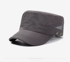 Detail of dark gray cadet cap showing breathable side mesh and metal ventilation eyelets