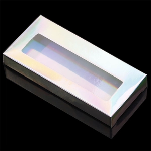 Holographic glitter eyelash box with transparent window on a reflective surface