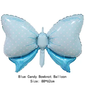 Blue bow foil balloon with white polka dots for baby party decoration, 88x62cm size