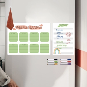 Magnetic weekly planner and to-do list set with 6 colorful pens on a white fridge