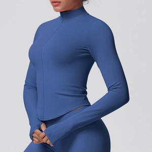 Detail of ribbed texture and thumbhole cuffs on navy zip-up yoga jacket for women