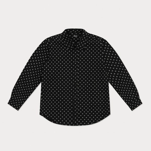 Detail of black cotton shirt featuring white cross flower print and classic button placket