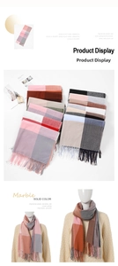 Detail of color block plaid scarf with soft fringe and thick cashmere-like texture