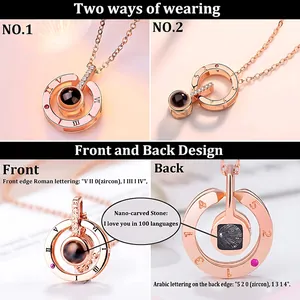 Rose gold projection necklace in 100 languages with Roman numerals and zircon stones