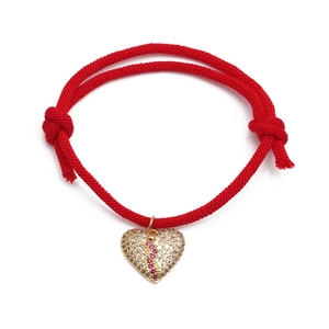 Minimalist red woven Milan rope bracelet with a gold heart pendant and zircon stones