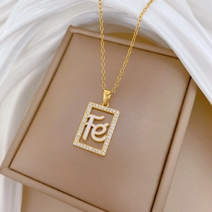 Elegant gold hollow square necklace with white zircon frame and cursive Fe letters
