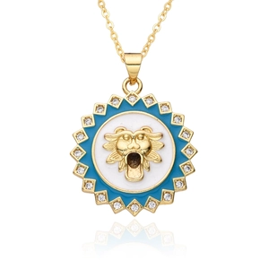 Gold lion head necklace with blue enamel and sparkling rhinestones on white background