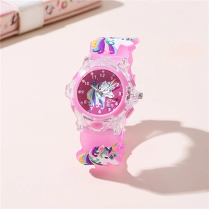 Detail view of pink silicone strap featuring 3D rainbow unicorn and analog watch dial