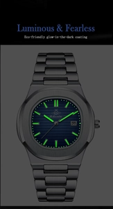 Macro detail of men's ultra-thin steel watch with green luminous dial and date display