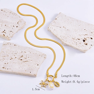Detail view of 46cm gold snake chain with shell pendants showing weight and size specs