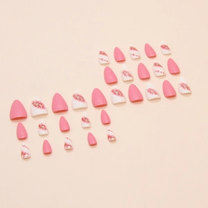 Faux ongles rose et blanc avec motif floral de cerisier en forme d'amande