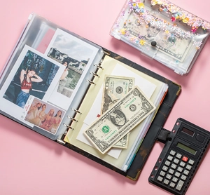 Close-up of PVC zipper binder pockets with a portable calculator for A5 and A6 notebooks