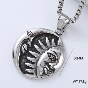 Macro shot of silver sun and moon medallion necklace showing texture and 30mm diameter