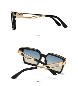 Detail view showing side and back of black sunglasses with gold metal temples