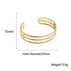Detail view showing 15mm width and 55mm inner diameter of gold layered stainless steel bangle