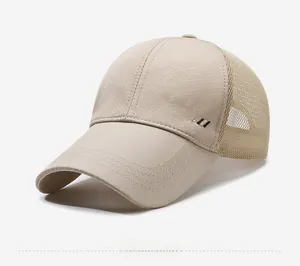 Detail view of breathable mesh fabric and embroidered SPORT logo on baseball cap