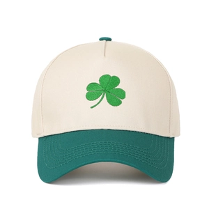 Classic color-block baseball cap with green shamrock embroidery on white cotton fabric