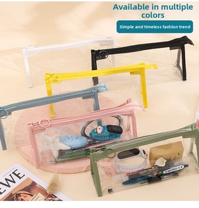 Detail of transparent PVC pencil cases in six colors with circular ring zippers