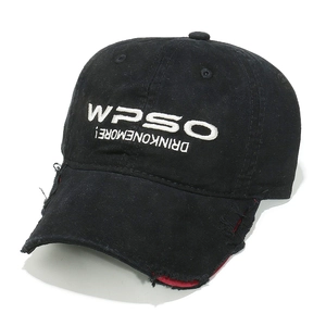 Detail of distressed baseball cap with inverted WPSO embroidery and red lining