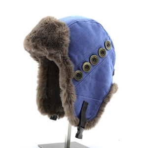 Winter blue aviator trapper hat with brown faux fur lining and bronze side buttons