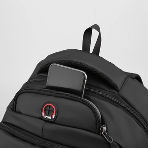 Large black Oxford travel backpack with convenient top zipper pocket for smartphone access