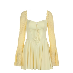 Elegant pale yellow French style dress with square neck and lace bell sleeves