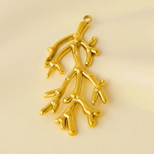 Macro view of gold stainless steel coral branch pendant for DIY jewelry making