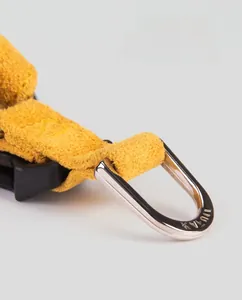 Detailed close-up of yellow nylon pet leash with a sturdy alloy D-ring connector