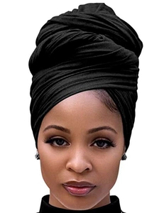 Detailed macro view of soft pure black cotton turban headwrap showing smooth fabric texture