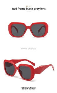 Detailed front and side view of large red frame sunglasses with dark grey UV lenses