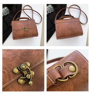 Detail of vintage brown handbag featuring embossed floral pattern and contrast stitching