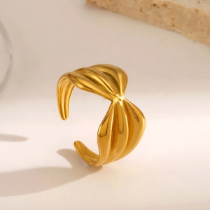 Polished 18K gold plated stainless steel bow ring with elegant twisted ribbon design