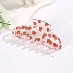 Transparent 10.5cm hair claw clip with red strawberry print on white background