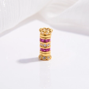 Detailed macro view of S925 silver cylinder bead with pink and white zircon inlay