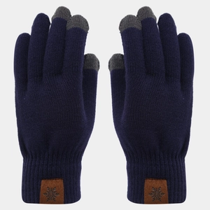 Detail of navy knit gloves featuring touch-screen fingertips and snowflake leather patch