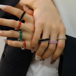 Minimalist titanium steel ring with colorful baguette cubic zirconia in a stacked display