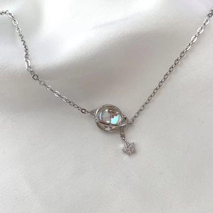 Elegant S925 sterling silver necklace with iridescent planet and zircon star pendant