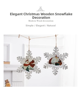 Detail of white wooden snowflake ornament with Santa illustration and hemp rope hanger