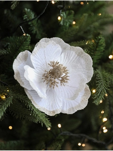 Close-up of 18cm white fabric Magnolia flower with silver glitter on Christmas tree