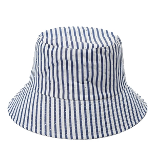 Chic blue and white striped bucket hat with a wide brim and breathable eyelets