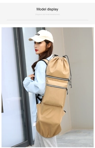 Outdoor model wearing khaki drawstring skateboard bag with side zipper for yoga or travel