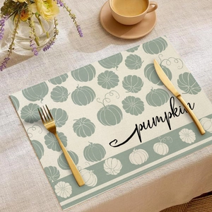Detailed view of rectangle pumpkin placemat with autumn print and home dining setup