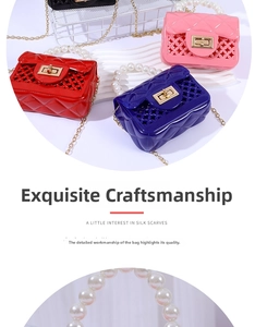 Close-up of mini jelly bag with pearl handle, metal chain and hollow weave pattern